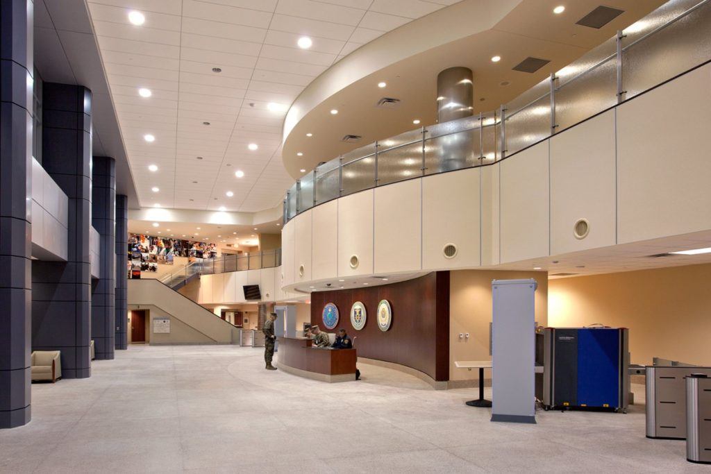 a large room with a bunch of tables and chairs