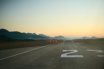 an airport runway with the number twenty on it