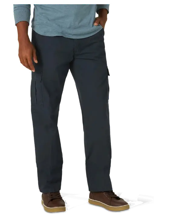 a man standing with his hands in his pockets